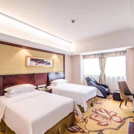 Vienna International Hotel Shanghai Pudong Xiupu Road Bagian luar foto