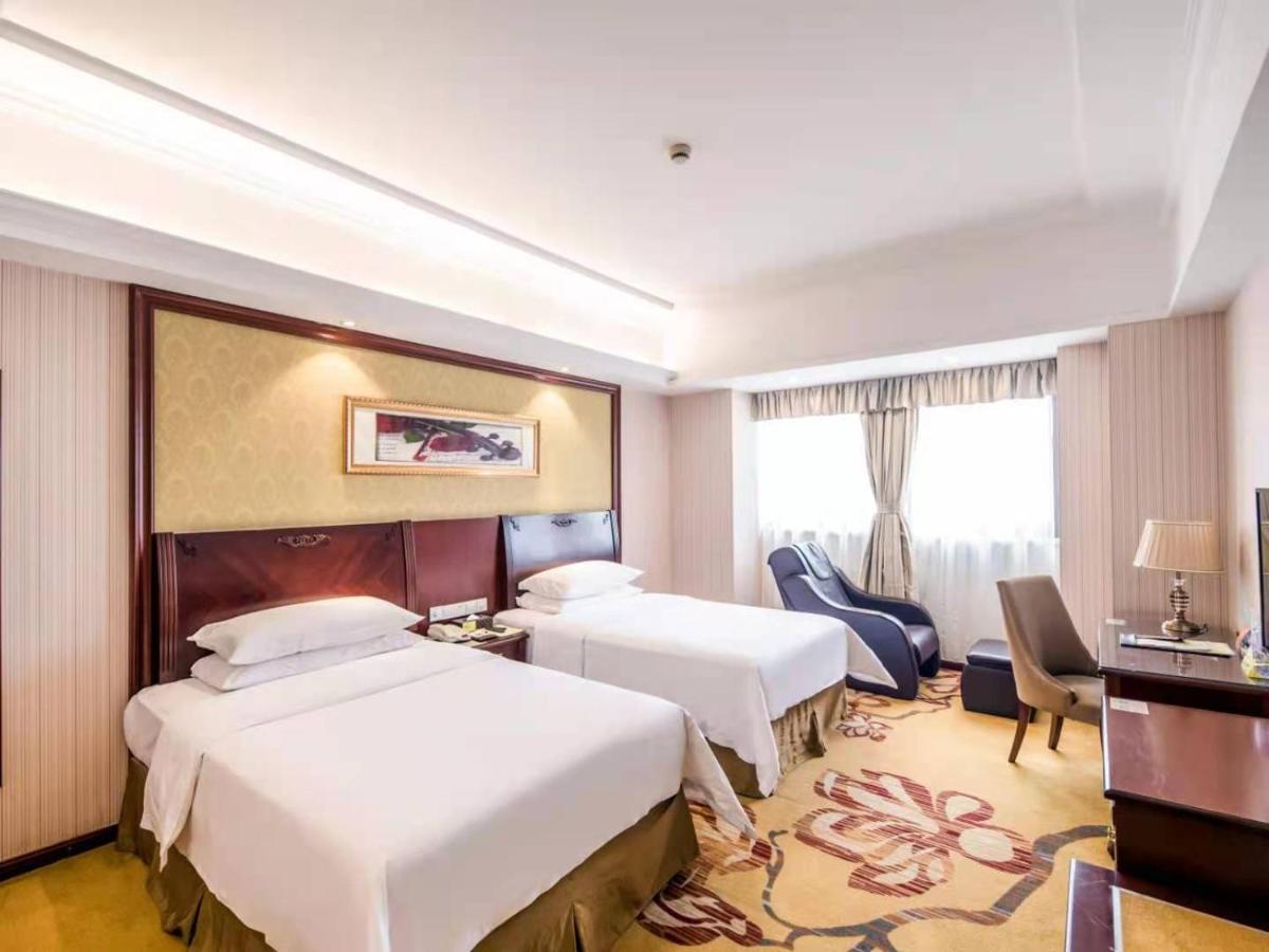 Vienna International Hotel Shanghai Pudong Xiupu Road Bagian luar foto