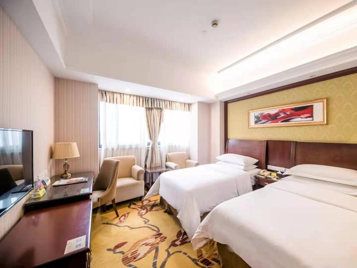 Vienna International Hotel Shanghai Pudong Xiupu Road Bagian luar foto