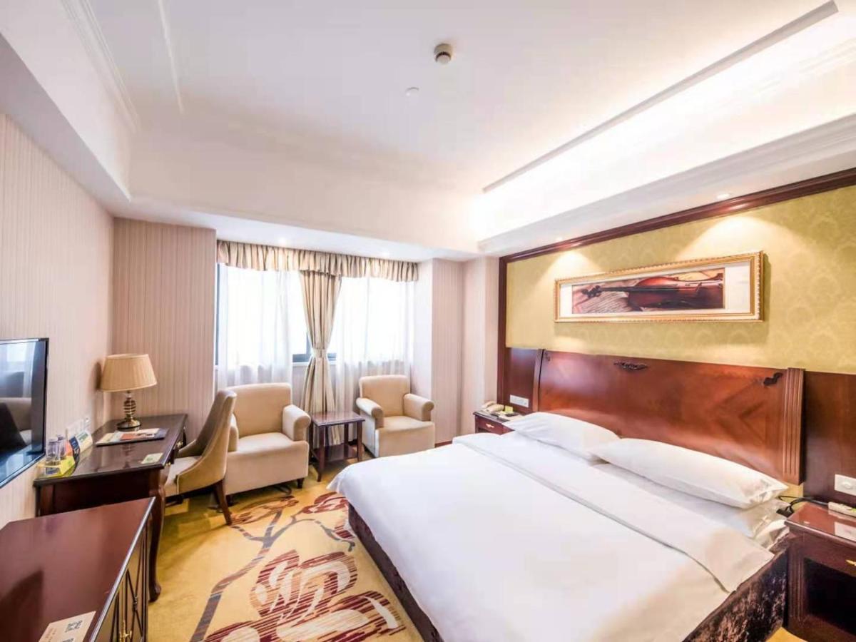 Vienna International Hotel Shanghai Pudong Xiupu Road Bagian luar foto