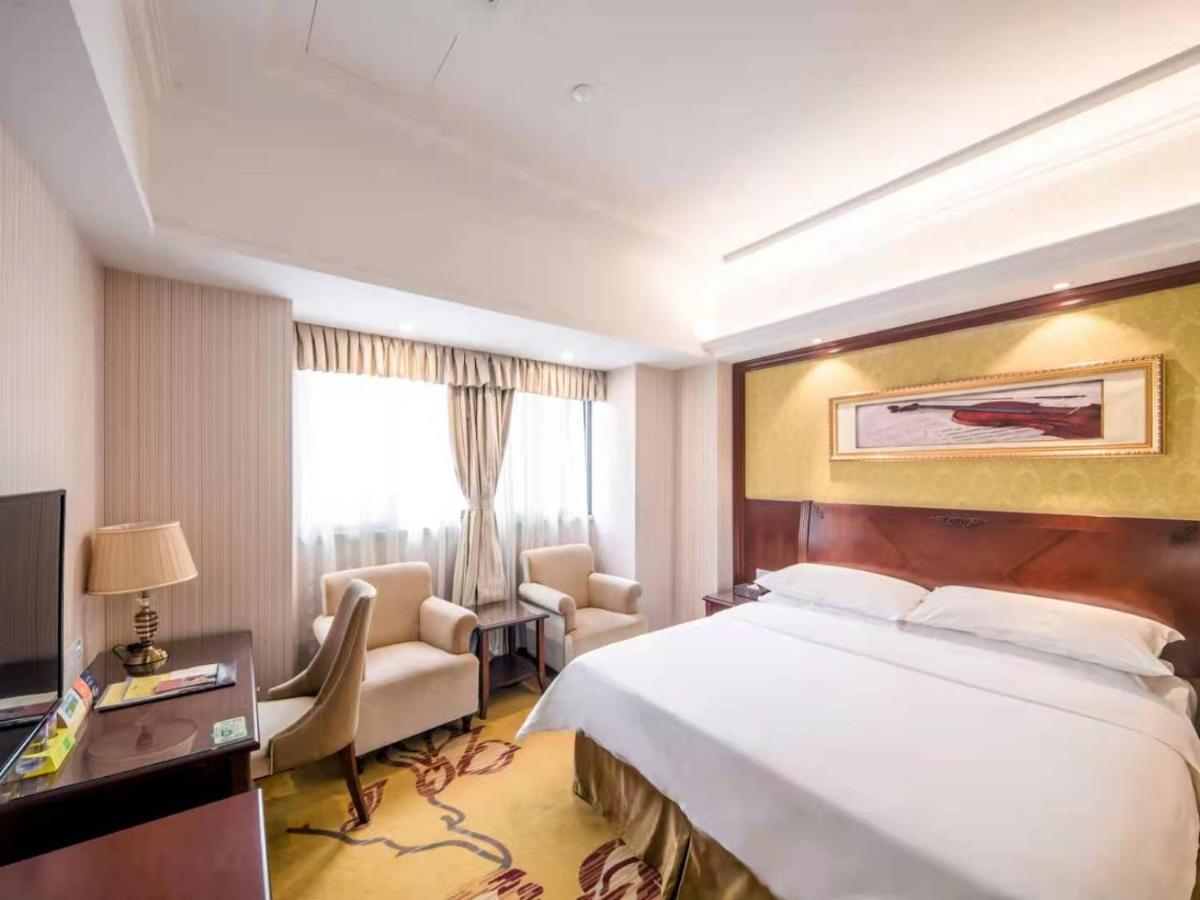 Vienna International Hotel Shanghai Pudong Xiupu Road Bagian luar foto
