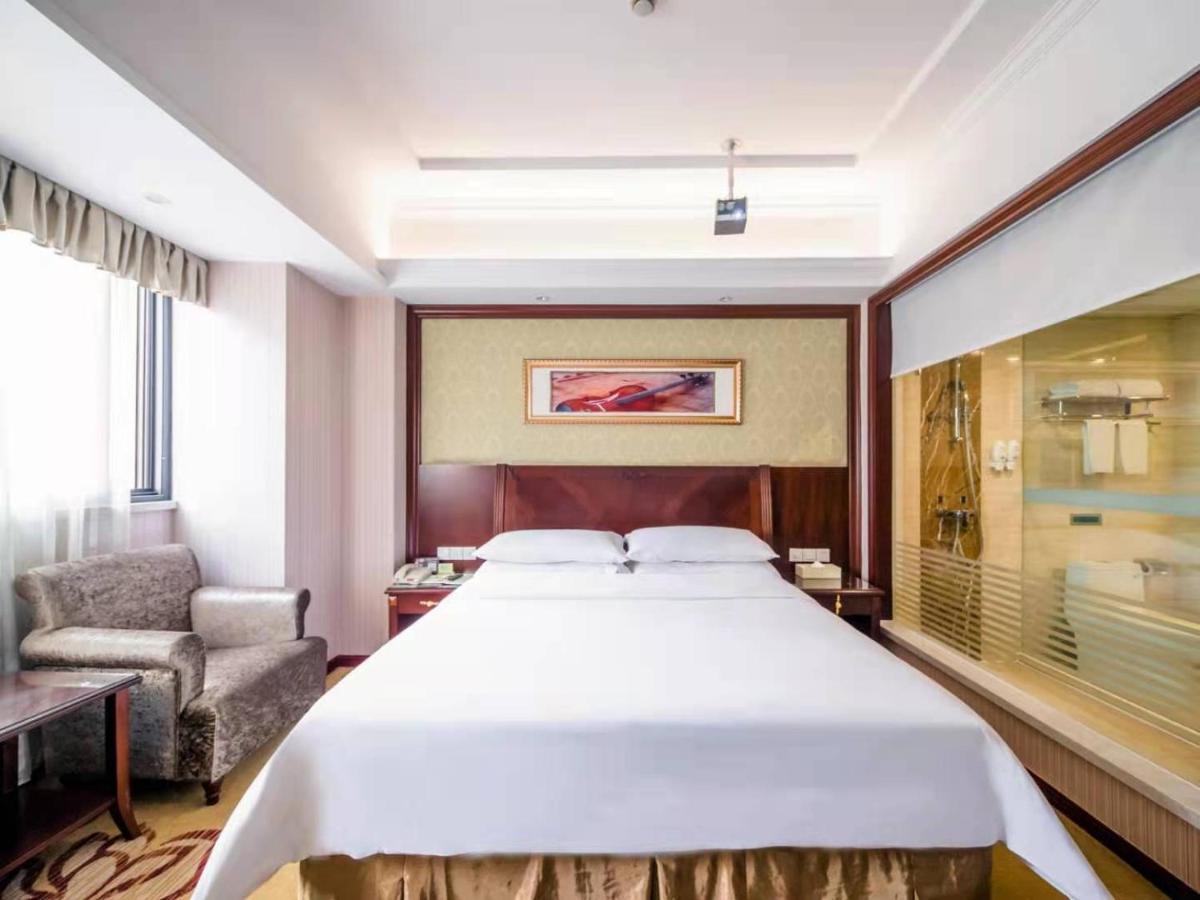 Vienna International Hotel Shanghai Pudong Xiupu Road Bagian luar foto