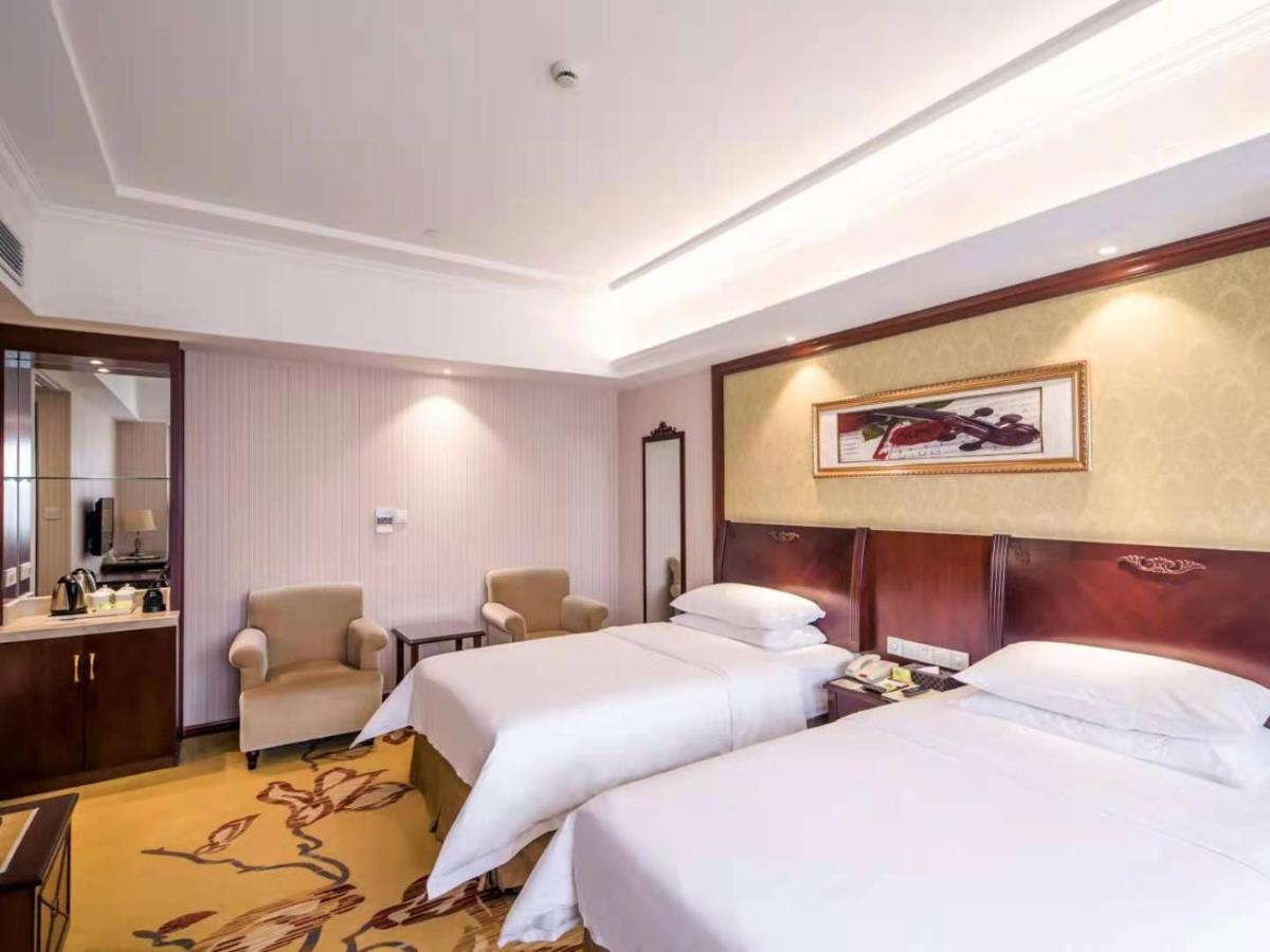 Vienna International Hotel Shanghai Pudong Xiupu Road Bagian luar foto
