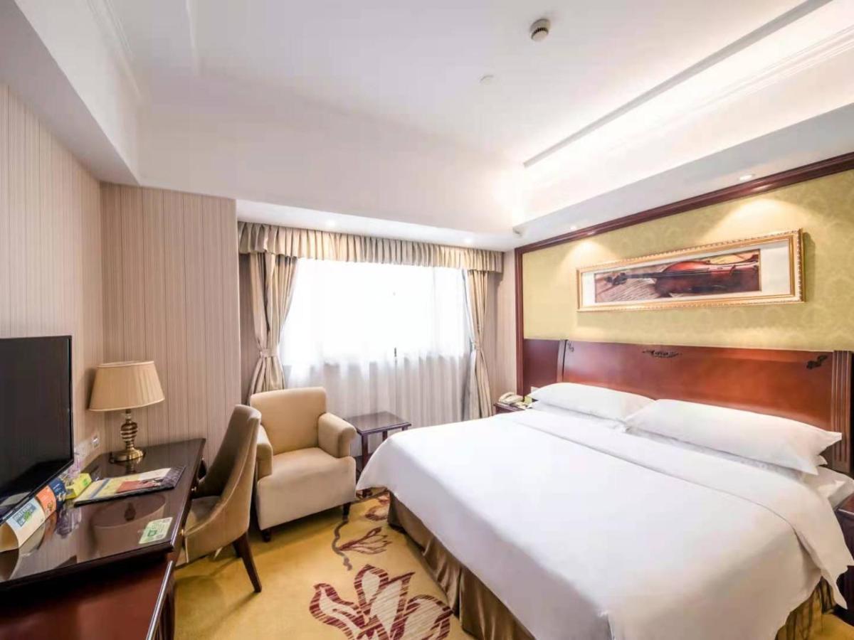 Vienna International Hotel Shanghai Pudong Xiupu Road Bagian luar foto