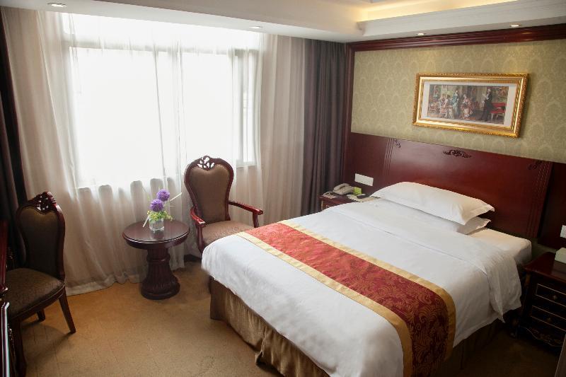 Vienna International Hotel Shanghai Pudong Xiupu Road Bagian luar foto
